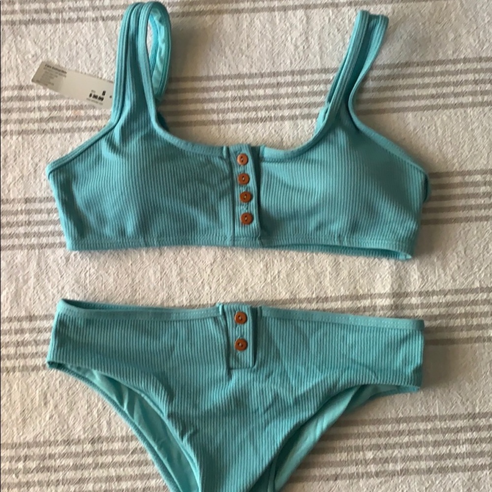 small BRAND NEW blue bikini with buttons!